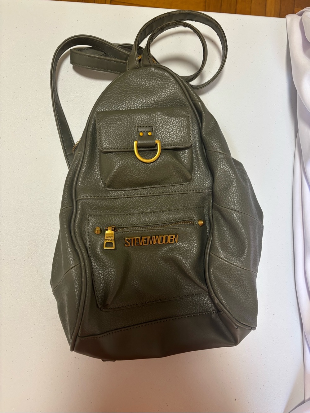 Steve Madden Wonen’s Olive-Taupe Leather Backpack with Gold Accents